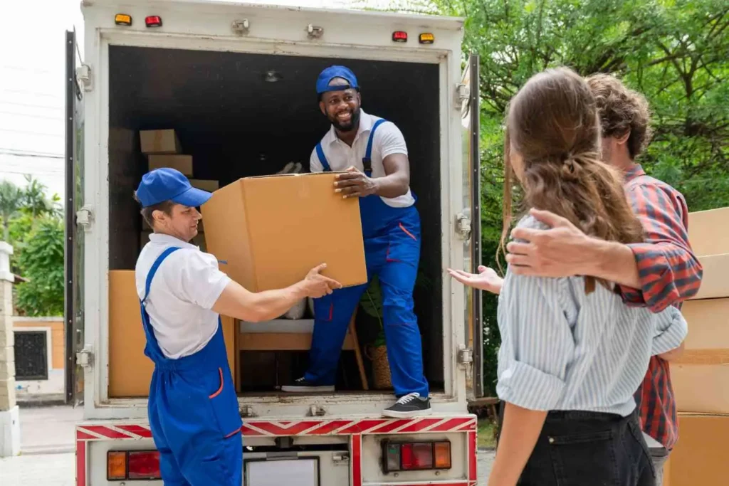 Best moving companies in Florida — licensed direct carrier crew loading a residential truck outside a Fort Lauderdale home